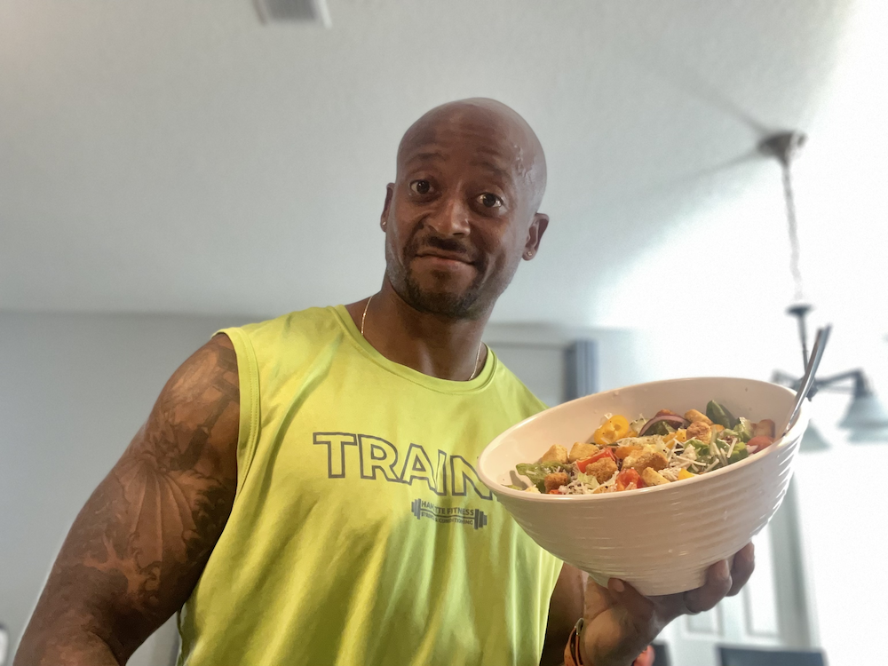 Allen Hamlette holding a big ass salad!